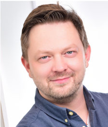 Portraitfoto von Sebastian Breu.